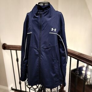 Men's Under Armour Golf jacket and pants set in navy blue with white trim.
